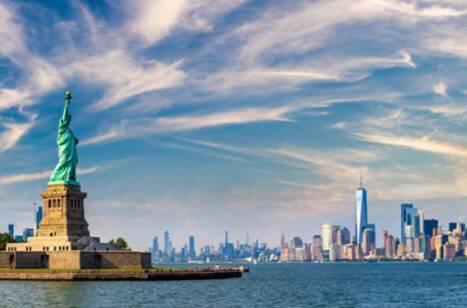 Panoramic image of New York skyline and the Statue of Liberty