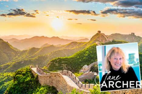 A panoramic view of the Great Wall of China at sunrise