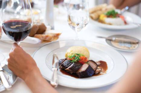 A meal in Compass Rose aboard Seven Seas Explorer, Regent Seven Seas Cruises