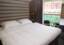 Royal Balcony Suite. Bed, Scenic Jewel