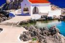 A church on the waters edge in Chios