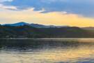 A panoramic view of Donji Milanovac at sunset