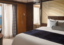 Deluxe Owner's Suite Bedroom, Pride of America