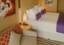 Premium Suite Bedroom & Living Area, Ambition, Ambassador Cruise Line